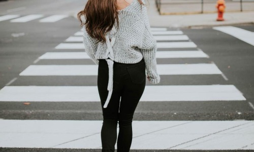 a person walking in a crosswalk