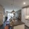 a kitchen with a bar and stools